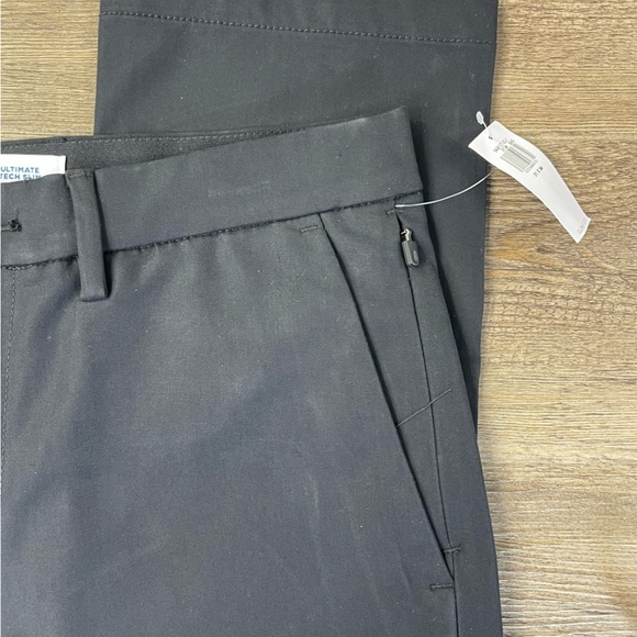 NWT Men’s Black Ultimate Tech Slim Chino Pants with Built in Flex, size 31x34 - Picture 5 of 10